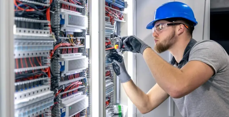 GB Electricals engineer at work on a control panel